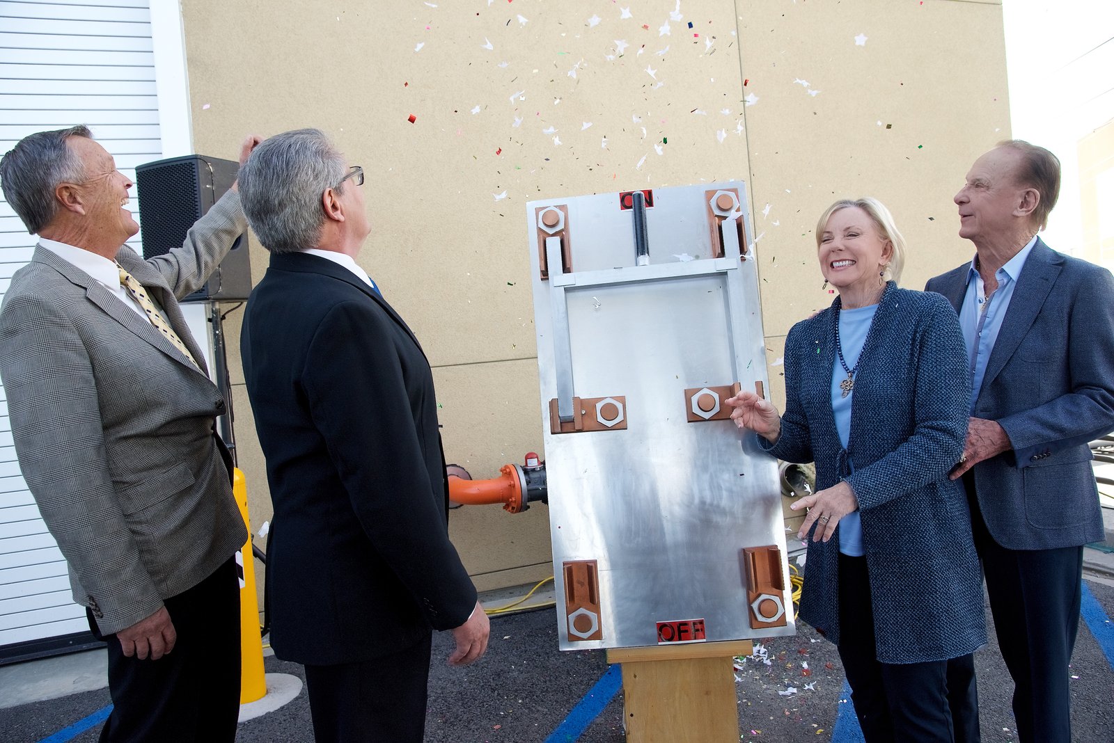 "Flipping the switch" to celebrate the operation of the Central Energy Plant